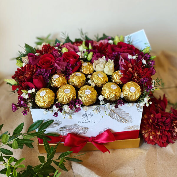 Ziedu kaste ar saldumiem
